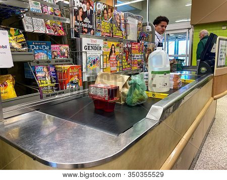 Orlando, Fl/usa-2/8/20: A Checkout Counter With Food On The Counter Of Publix Grocery Store.