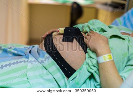 Pregnant Woman In Hospital With Cardiotocography Bell