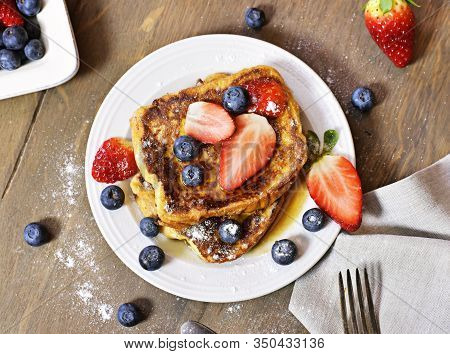Delicious French Toast With Fresh Fruits And Maple Sirup. Tasty Breakfast Scene Or Dessert With Toas