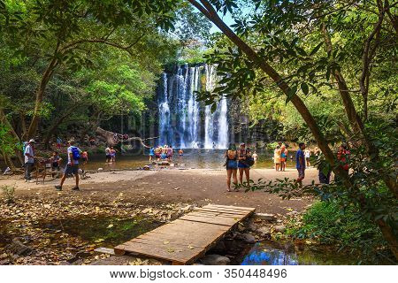 Bagaces, Costa Rica - January 17, 2020 : People Enjoy Playing And Swimming At Llanos The Cortes Wate