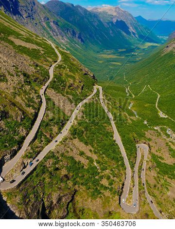 Trolls Path Trollstigen Winding Scenic Mountain Road With Many Cars, Norway Europe. National Tourist