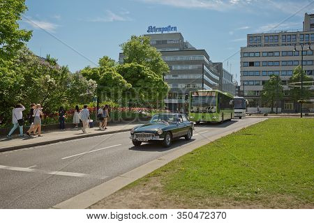 People Enjoying City Life During Sunny Summer Day At In Oslo, Norway
