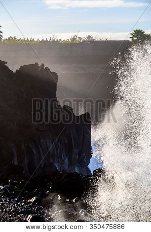 Dangerious Ocean Stormy Waves Hits Black Lava Rocks On La Palma Island, Canary, Spain