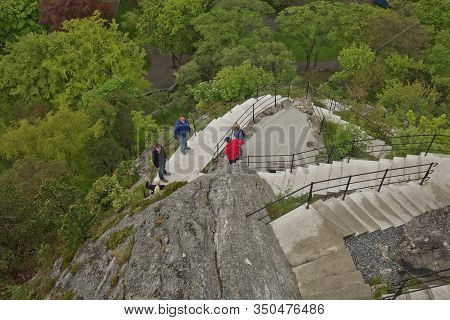 People Climbing The Stairs To Fjellstua In Alesund In Norway