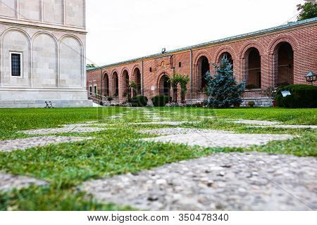 Green Garden With Clean Grass In The Churchyard.