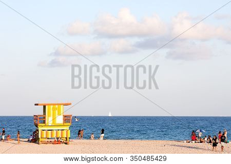 Miami Beach, Florida, United States - March 23, 2012: People Enjoying The Evenig At South Beach.