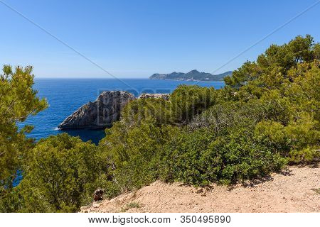 Rocky Coast With Blue Sea. Cala Ratjada , North-east Coast Of Majorca. Spain