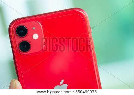 Bangkok, Thailand - February 14, 2020: Close Up Of Camera In Apple Iphone 11 Red. New Smartphones Fr