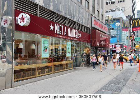 New York, Usa - July 4, 2013: People Walk By Pret A Manger Restaurant In New York. It Is A British R