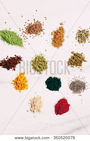 Top View Various Dietary Supplements Scattered On The Table