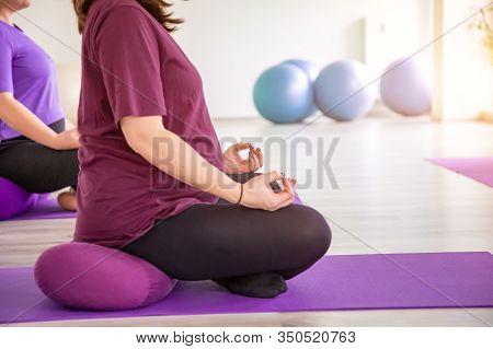 Pregnant Women Are Doing Yoga And Maditing In Yoga Class, Healthy Prenatal Lifestyle