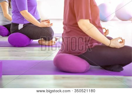 Pregnant Women Are Doing Yoga And Maditing In Yoga Class, Healthy Prenatal Lifestyle