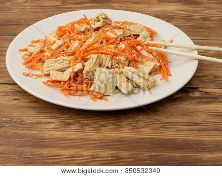 Spicy Chinese Or Korean Yuba Tofu Bamboo And Carrots Salad On Wooden Background
