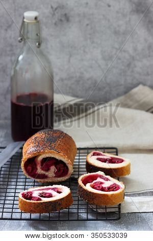 Traditional Moldovan Or Romanian Cake From Yeast Dough With Cherries.