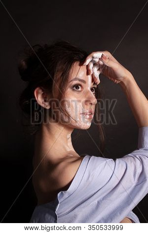 Fashion Beauty Portrait Of Beautiful Young Brunette Woman. White Paint On The Body And Face.