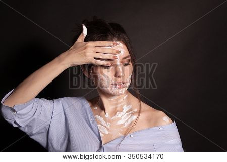 Fashion Beauty Portrait Of Beautiful Young Brunette Woman. White Paint On The Body And Face.