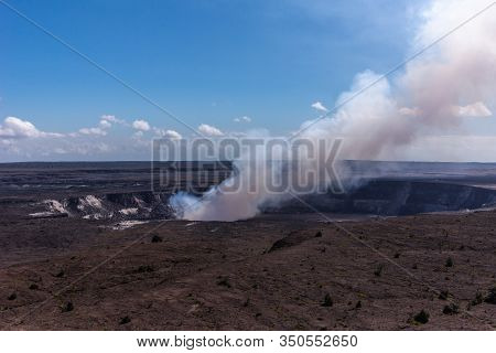 Kilauea Volcano, Hawaii, Usa. - January 9, 2012: View On Full Circle Kalemaumau Crater Producing Whi