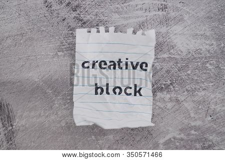 Scrunched Paper With Creative Block Text On Desk, Lack Of Inspiration