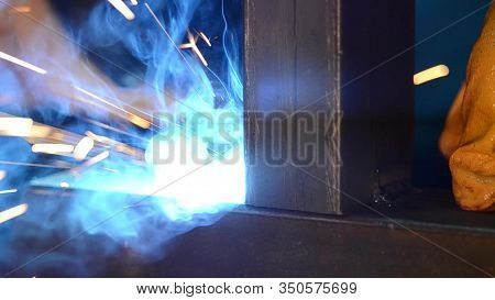 Electric Welding Of Steel Parts In Production. A Close-up.