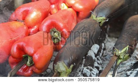 Red Peppers And Eggplant Are Grilled. Close-up. Macro.