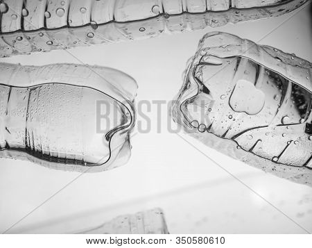 Plastic Water Bottle Floating In Water, Non-decomposable Plastic, Concept For Environmental Pollutio