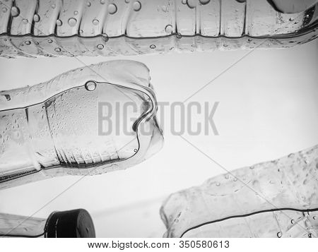 Plastic Water Bottle Floating In Water, Non-decomposable Plastic, Concept For Environmental Pollutio