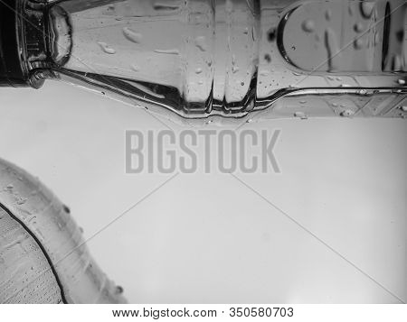 Plastic Water Bottle Floating In Water, Non-decomposable Plastic, Concept For Environmental Pollutio
