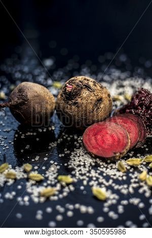 Close Up Of Fresh Beetroot Halwa Or Beet Ka Halwa In A Plate With Some Spread Sugar Crystals And Ela