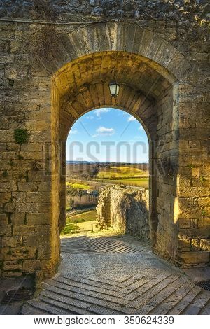 Monteriggioni Medieval Fortified Village Old Town Gateway And Via Francigena, Siena, Tuscany. Italy 