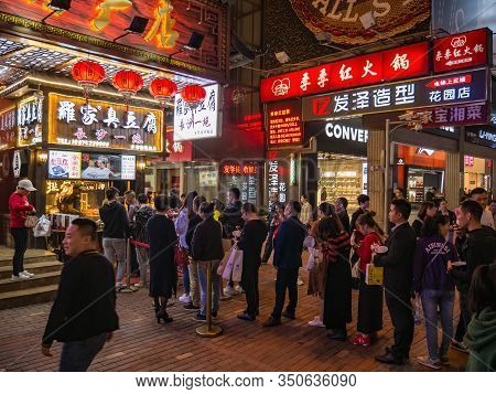 Changsha/china-17 October 2018:unacquainted People Walking On Huangxing Walking Street In Changsha C