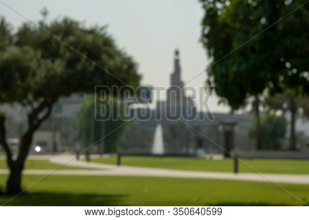 Blurred Background Of Al Fanar Islamic Cultural Center With Green Park In Doha, Qatar.