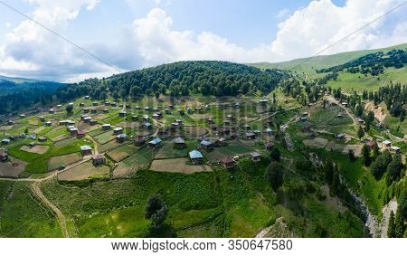 Beautiful Nature With Country Cottages And Traditional Wooden Houses On The Road Through The Goderdz