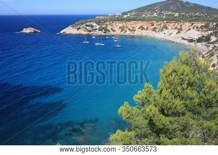 The Coast Of Ibiza In The Mediterranean Sea On A Beautiful Sunny Summer Day In Spain