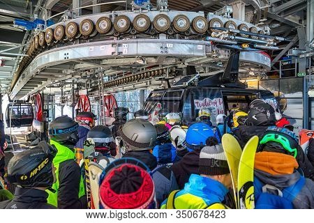Demanovska Dolina, Slovakia - February 8: Many Skiers In Station Of Cableway Funitel In Ski Resort J