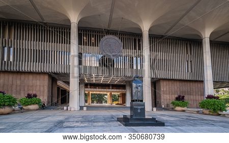 Honolulu  Oahu, Hawaii, Usa. - January 10, 2012: Front Entrance To State Capitol Shows Pillars With 