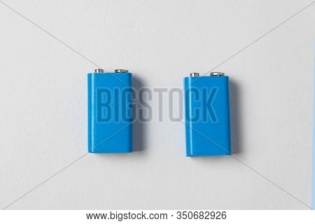 Two Blue Pp3 Batteries On White Background. Main Battery For Personal Power Supplies. Copy Space.