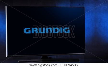 Flat-screen Tv Set Displaying Logo Of Grundig