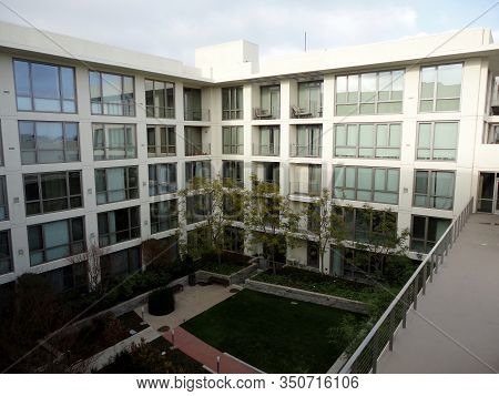 San Francisco - January 30, 2011: Park Inside Modern Condo Building, 255 Berry Street, And Other Bui