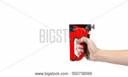 Red Industrial Stapler, Furniture Industry Hardware. Isolated On White.