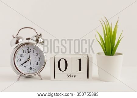 May 1 On The Wooden Calendar.the First Day Of The Spring Month, A Calendar For The Workplace. Spring
