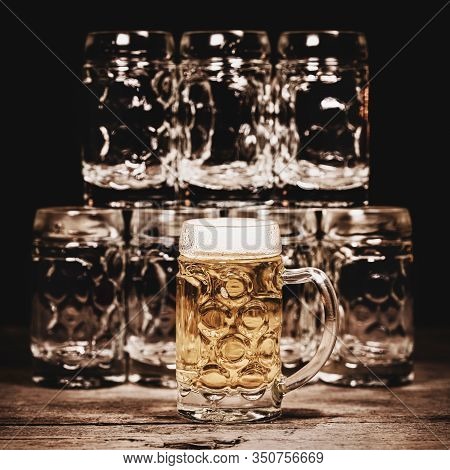 Beer Glasses Or Jugs On Wooden Table, Promotion For Gastronomy, Pub And Tavern, Beer Culture, Square