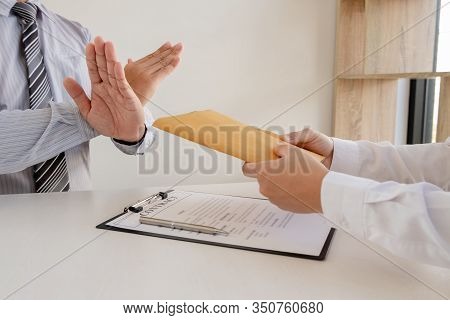 The Businessman Denies The Money In Envelope Proposed By His Partner To Bribe The Concept Of Bribery