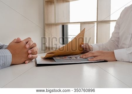 Businessmen Make An Agreement With The Money Proposed His Partner To Bribe In The Company. The Conce