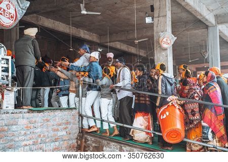 Amritsar India - Febuary 8, 2020: Crowds Of People Walk Into The Free Kitchen (langar) To Get Food I