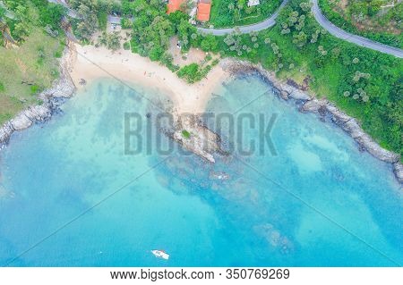 Aerial View Of Beautiful Tropical Beach And Sea With Palm And Other Tree In Phuket Island For Travel