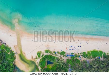 Aerial View Of Beautiful Tropical Beach And Sea With Palm And Other Tree In Phuket Island For Travel