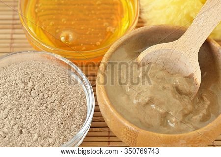 Homemade Rhassoul (ghassoul) And Honey Face Mask In Wooden Bowl With Spoon