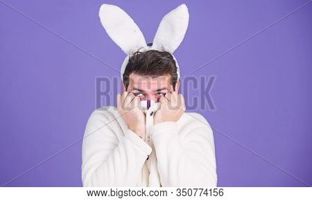 Soft And Tender. Guy With Long Bunny Or Rabbit Ears On Violet Background. Enjoy Tenderness. Cute Bun