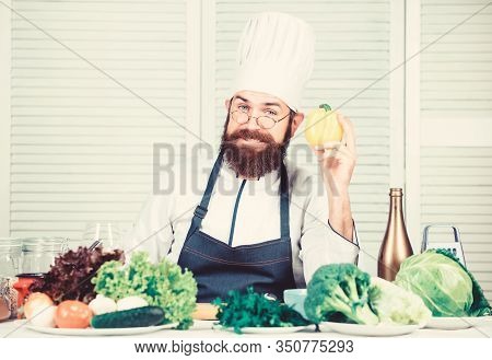 Right Nutrition. Healthy Food Cooking. Bearded Man Cook In Kitchen, Culinary. Chef Man In Hat. Secre