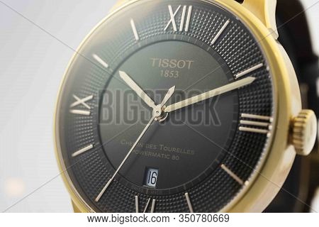 Le Locle, Switzerland 15.01.2020 - Tissot Man Watch Stainless Steel Case, Gold Pvd Coating Black Clo